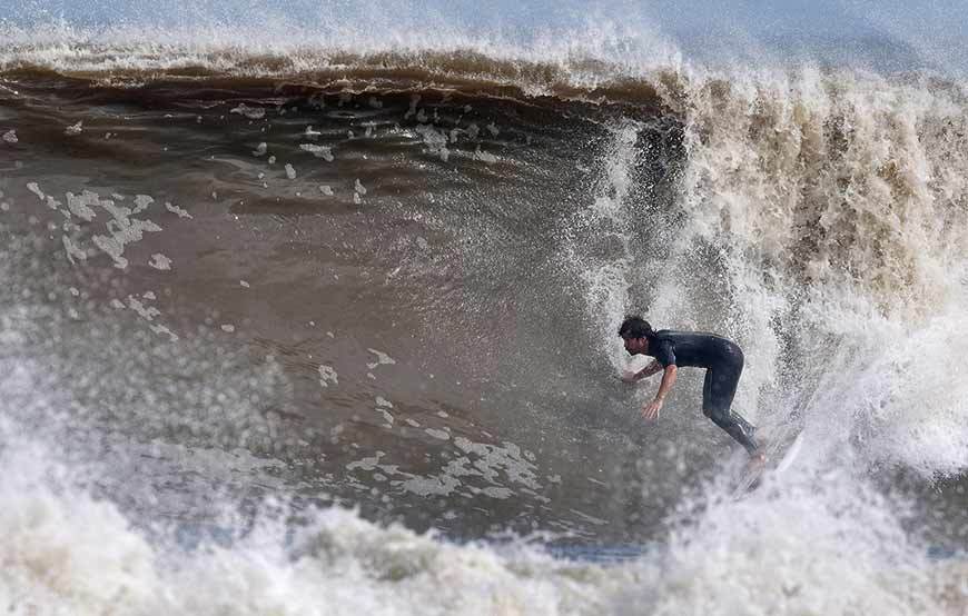 surfing hurricane irene waves in new jersey