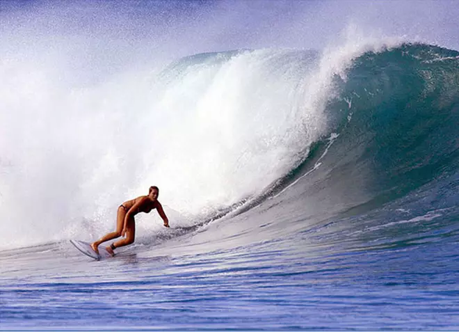 Erica Hosseini surfing